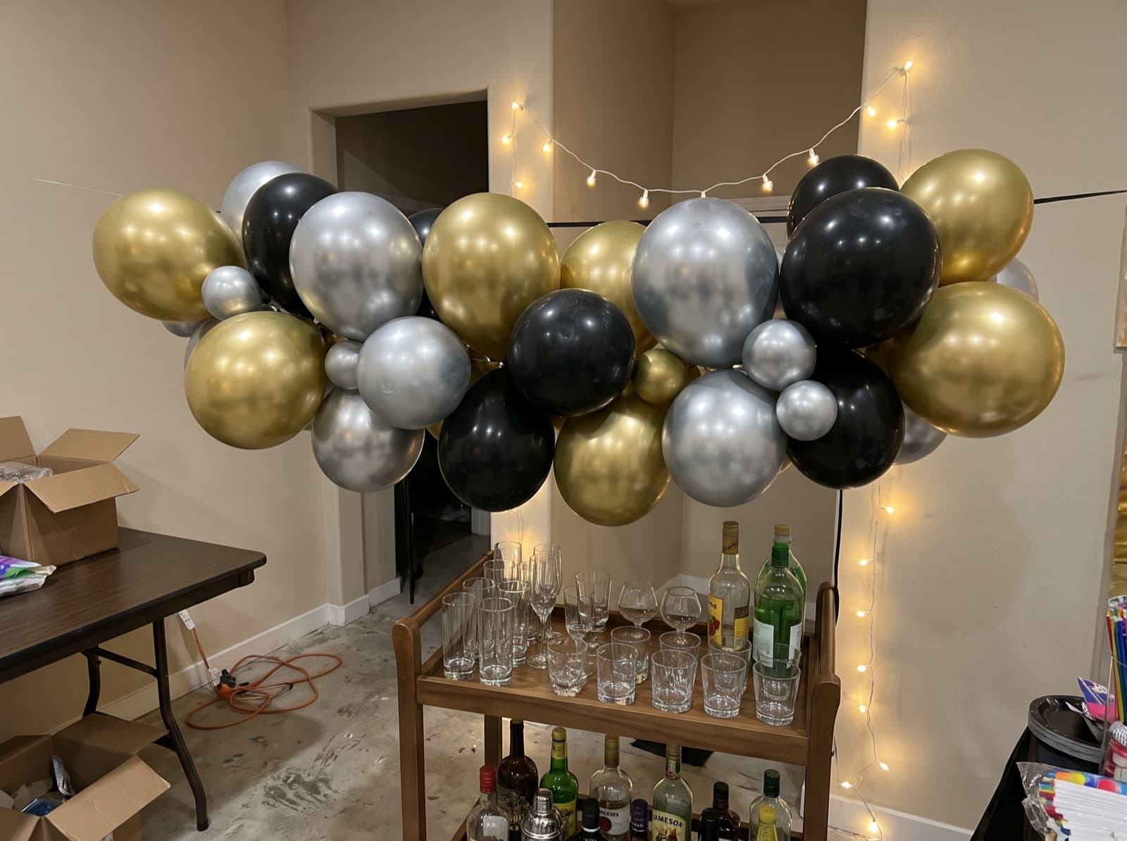 Chrome and pearl balloon garland for New Year's Eve