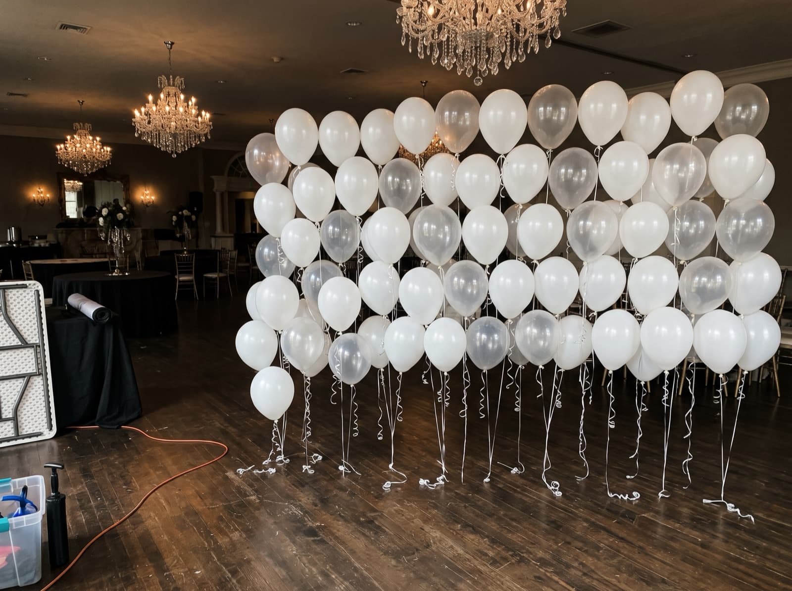 Floating helium balloon wall with ribbons